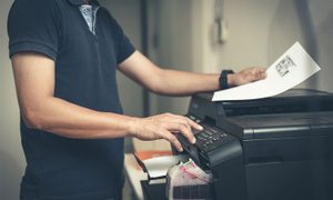 Office worker using a printer