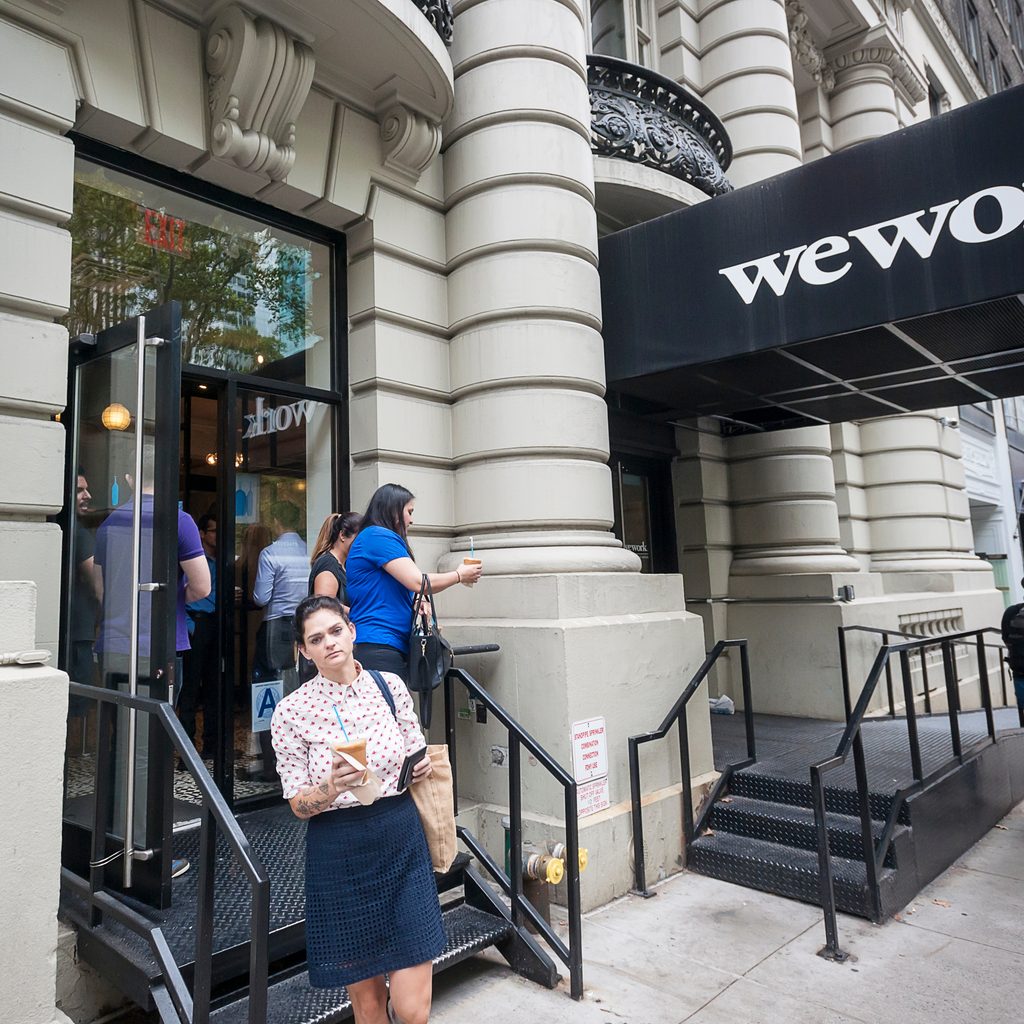 Woman Leaving WeWork Office
