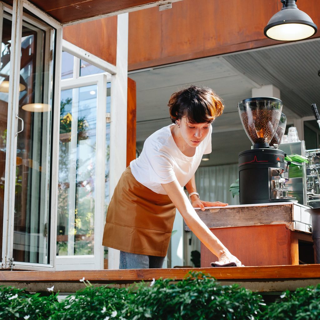 Woman Cleaning Outside