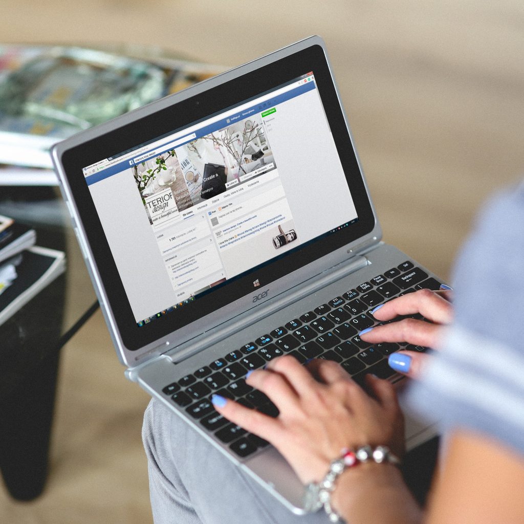 Woman Typing Notebook Computer