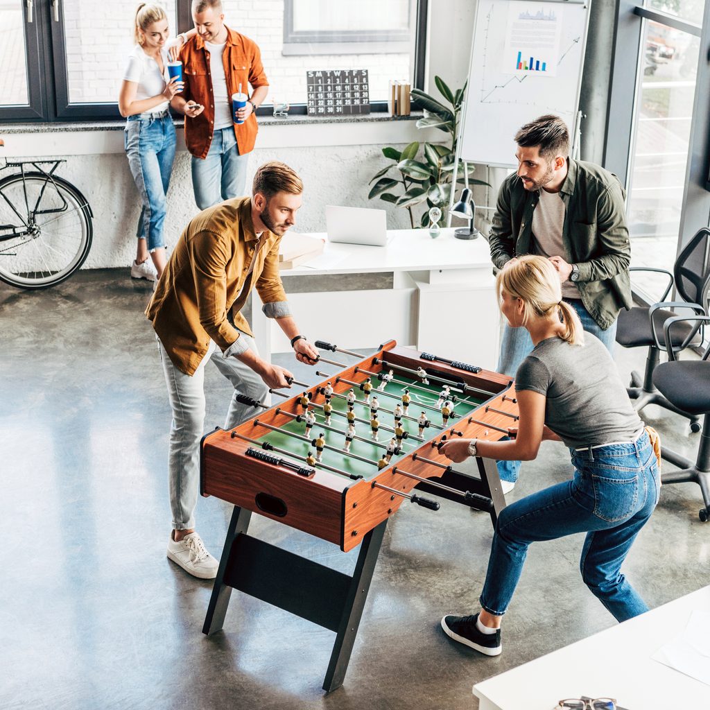 Young Employees Playing At Work