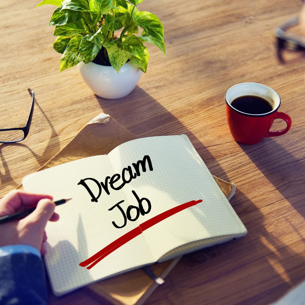 Businessperson writing in notebook