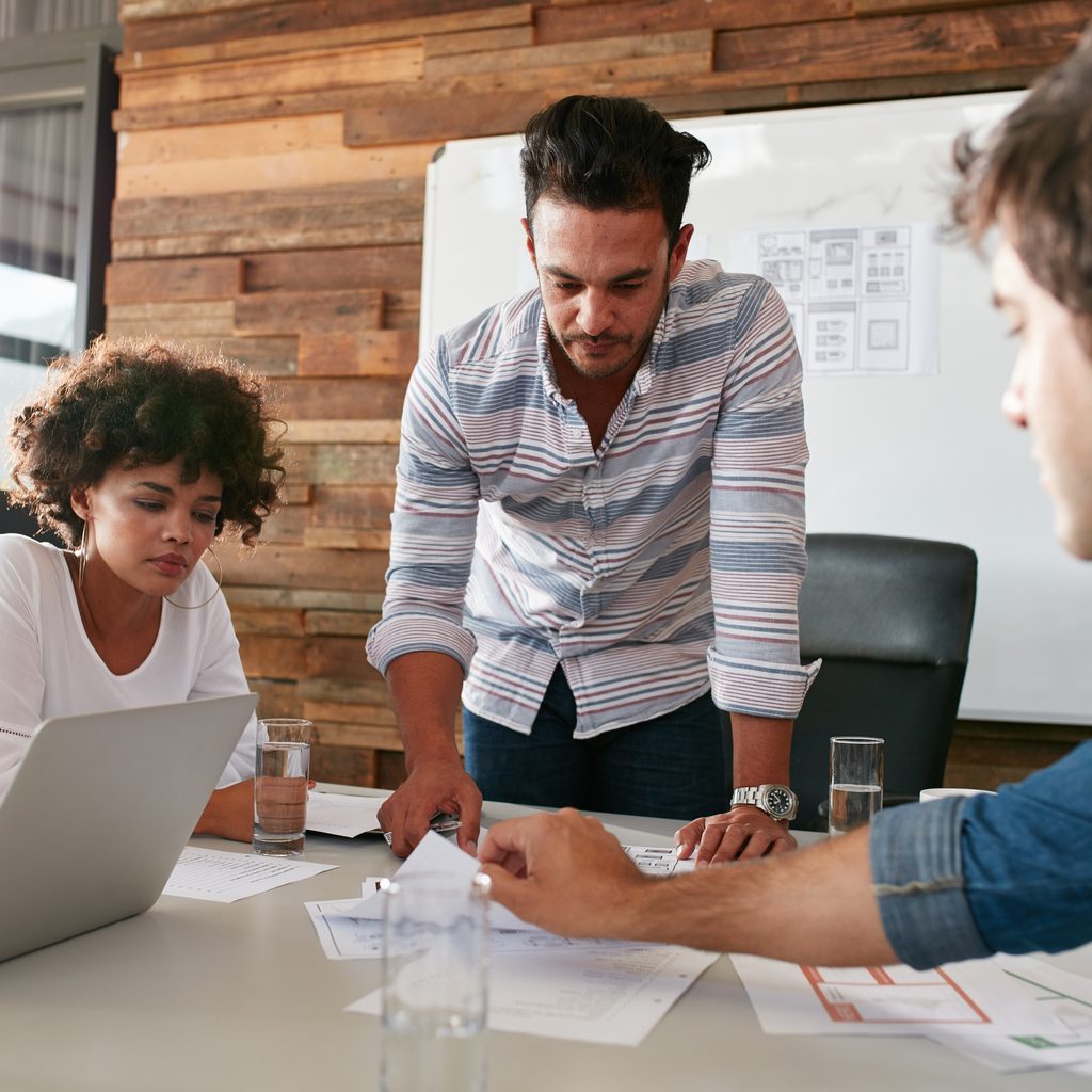 Young man discussing market research