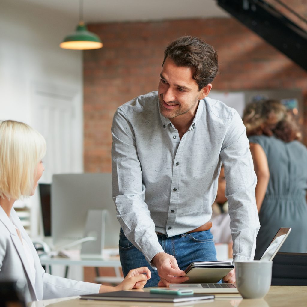 Office manager discussing work