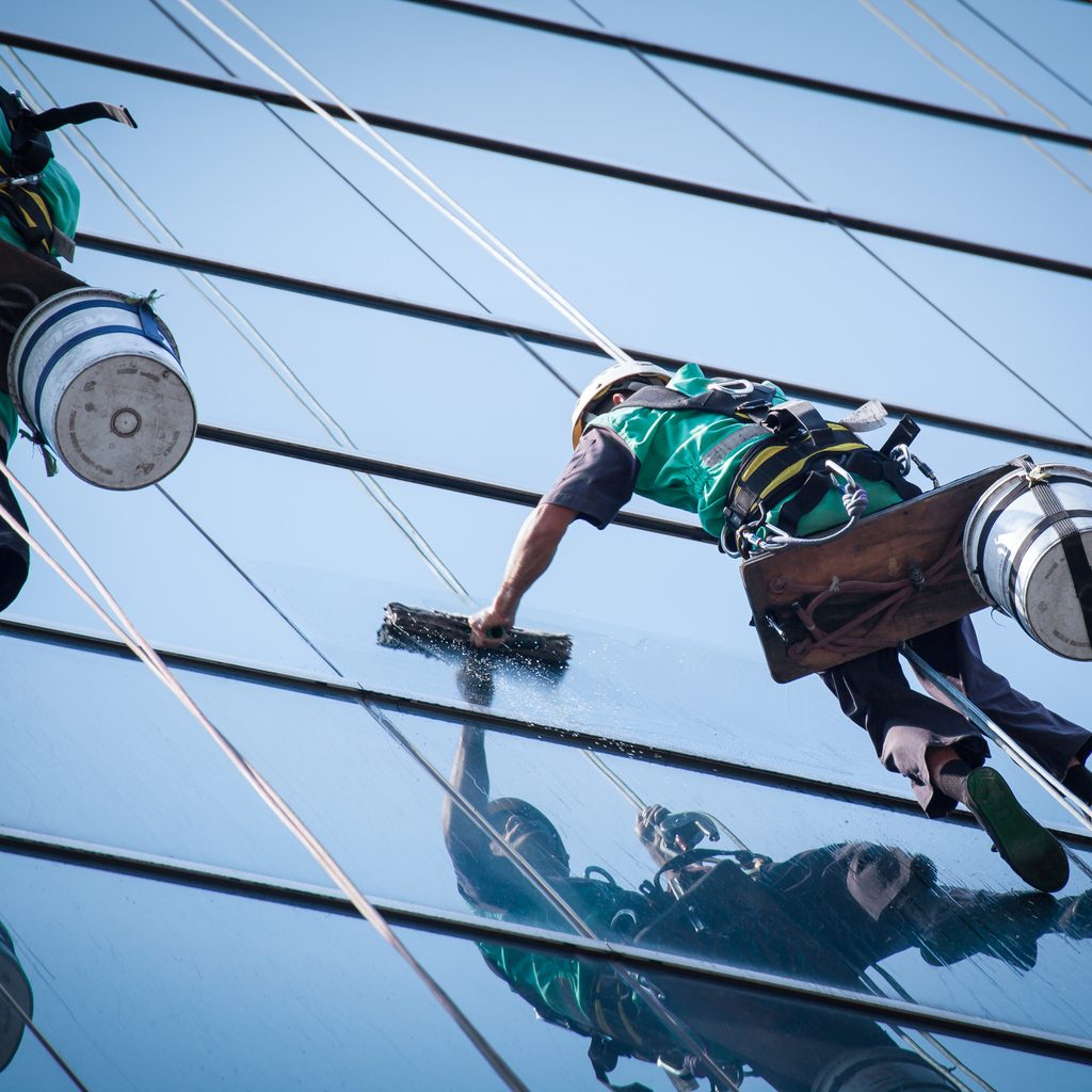 Workers washing windows
