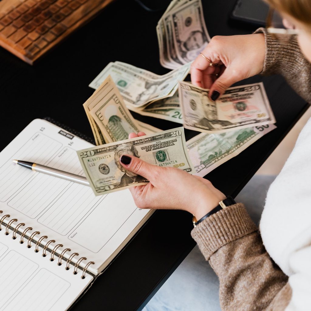 Photo of a person counting money