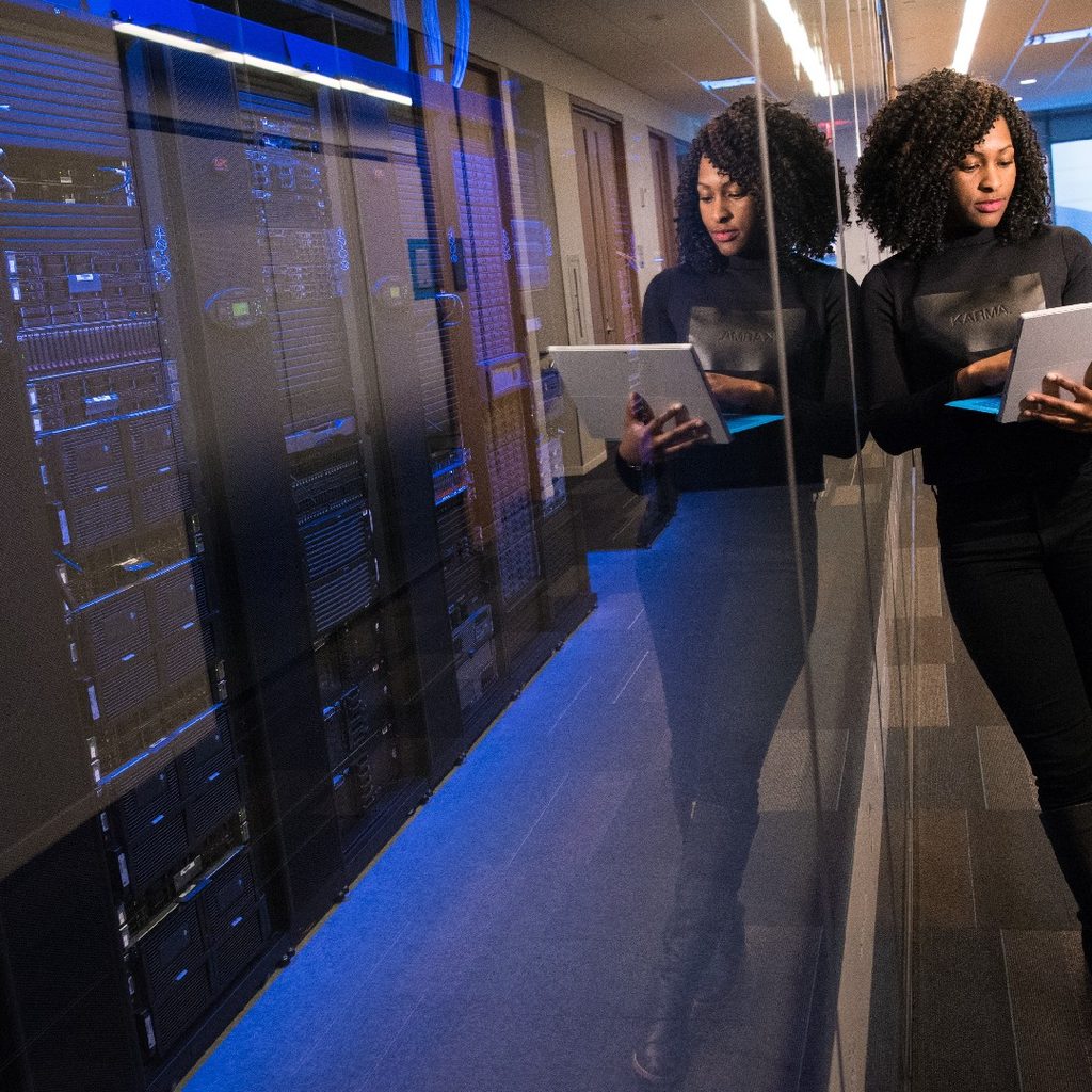 woman next to servers