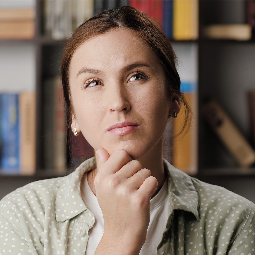 Woman considering what needs to be cleaned