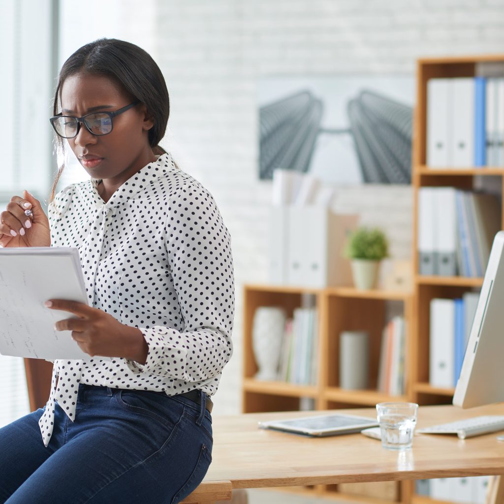 African American business woman with contract