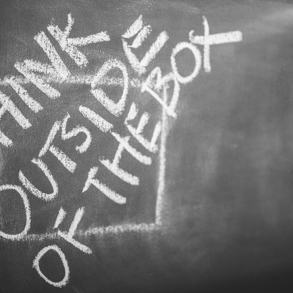 Phrase about innovation written on chalkboard