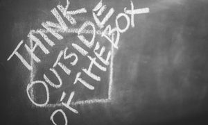 Phrase about innovation written on chalkboard