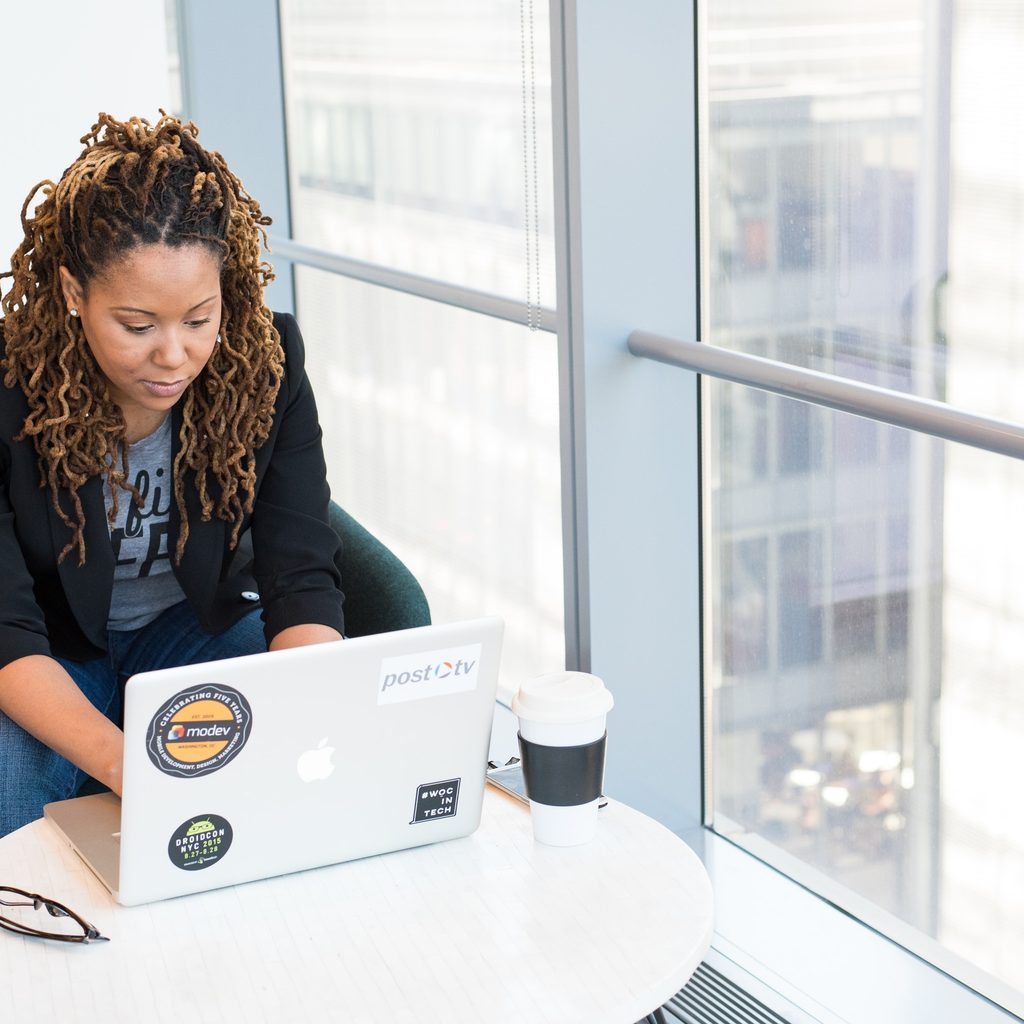 African American woman using laptop