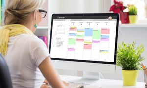 time management apps woman using computer