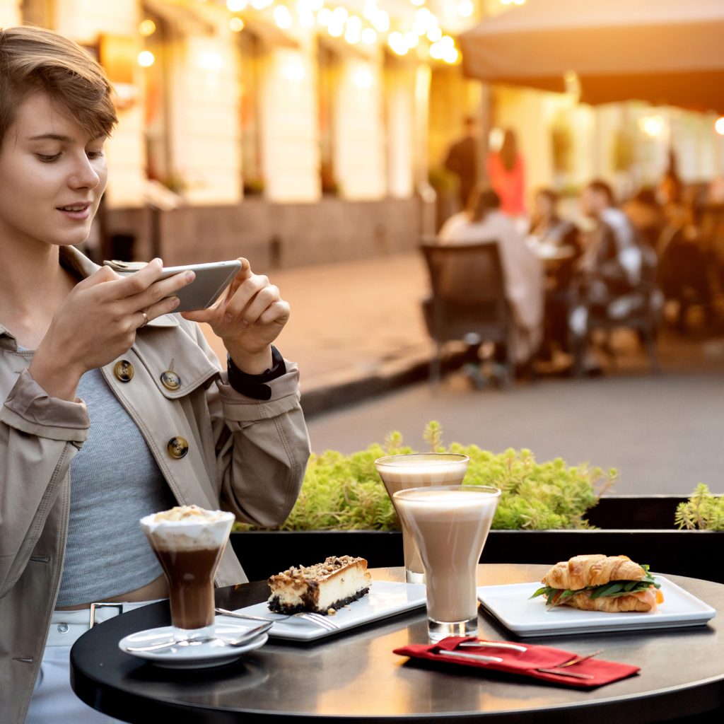 Customer taking photos of food