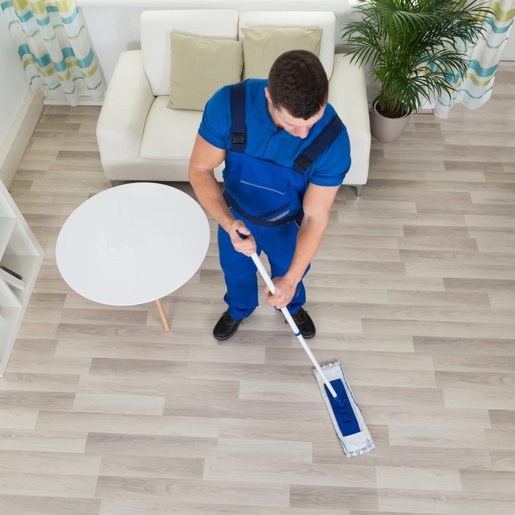 Overhead view of person cleaning the floor