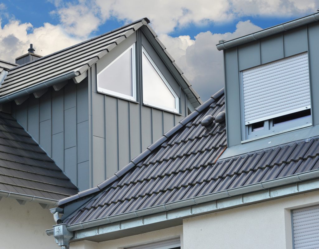Large house with a gray metal roof