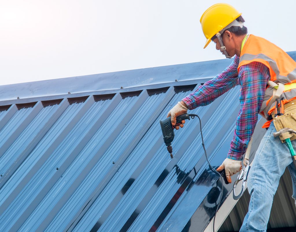 Person working on metal roof
