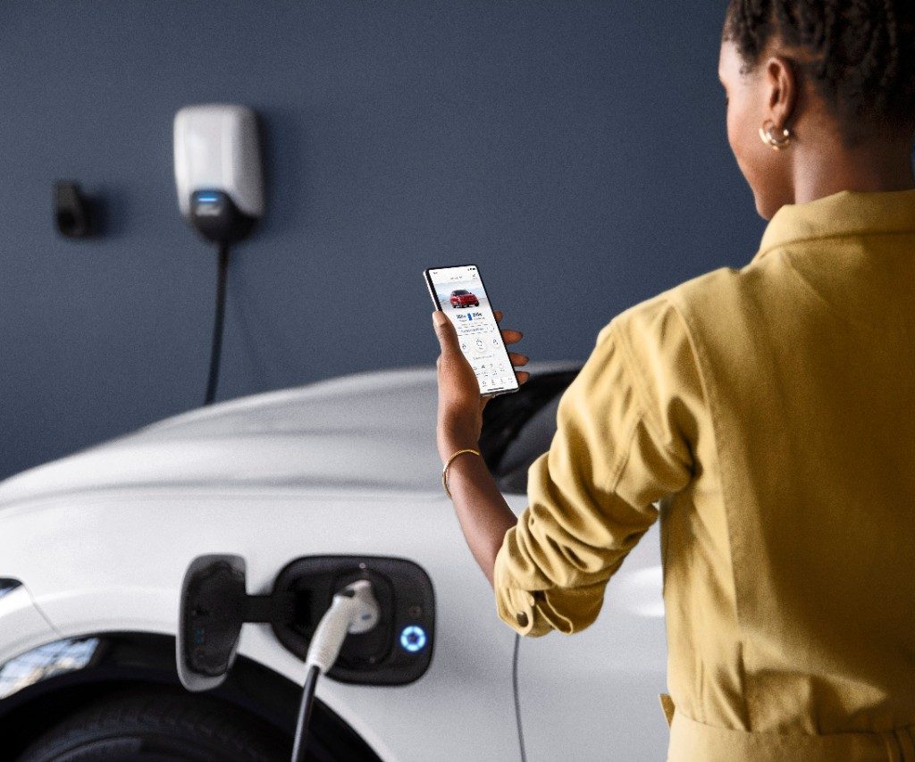 EV owner charging their vehicle