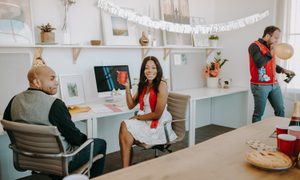 serving platters office party man woman