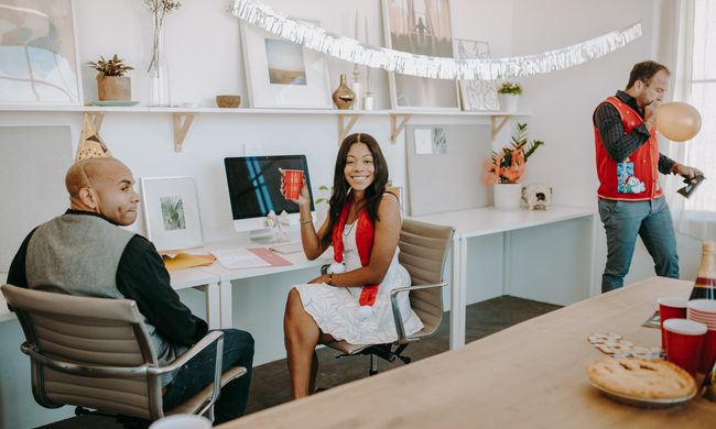 serving platters office party man woman