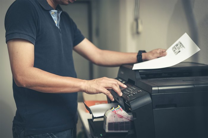 Office worker using a printer