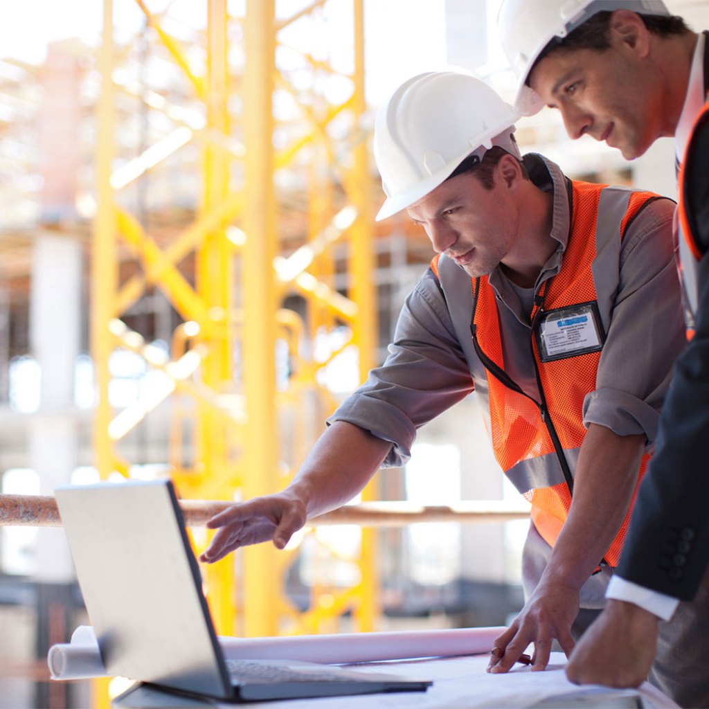 workers using laptop
