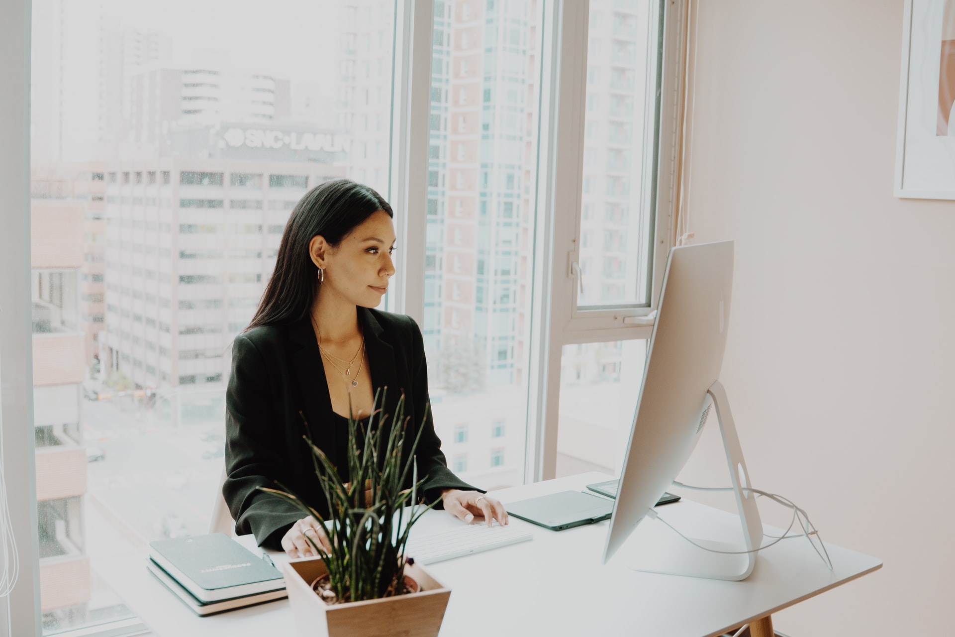 A woman at her desk, working