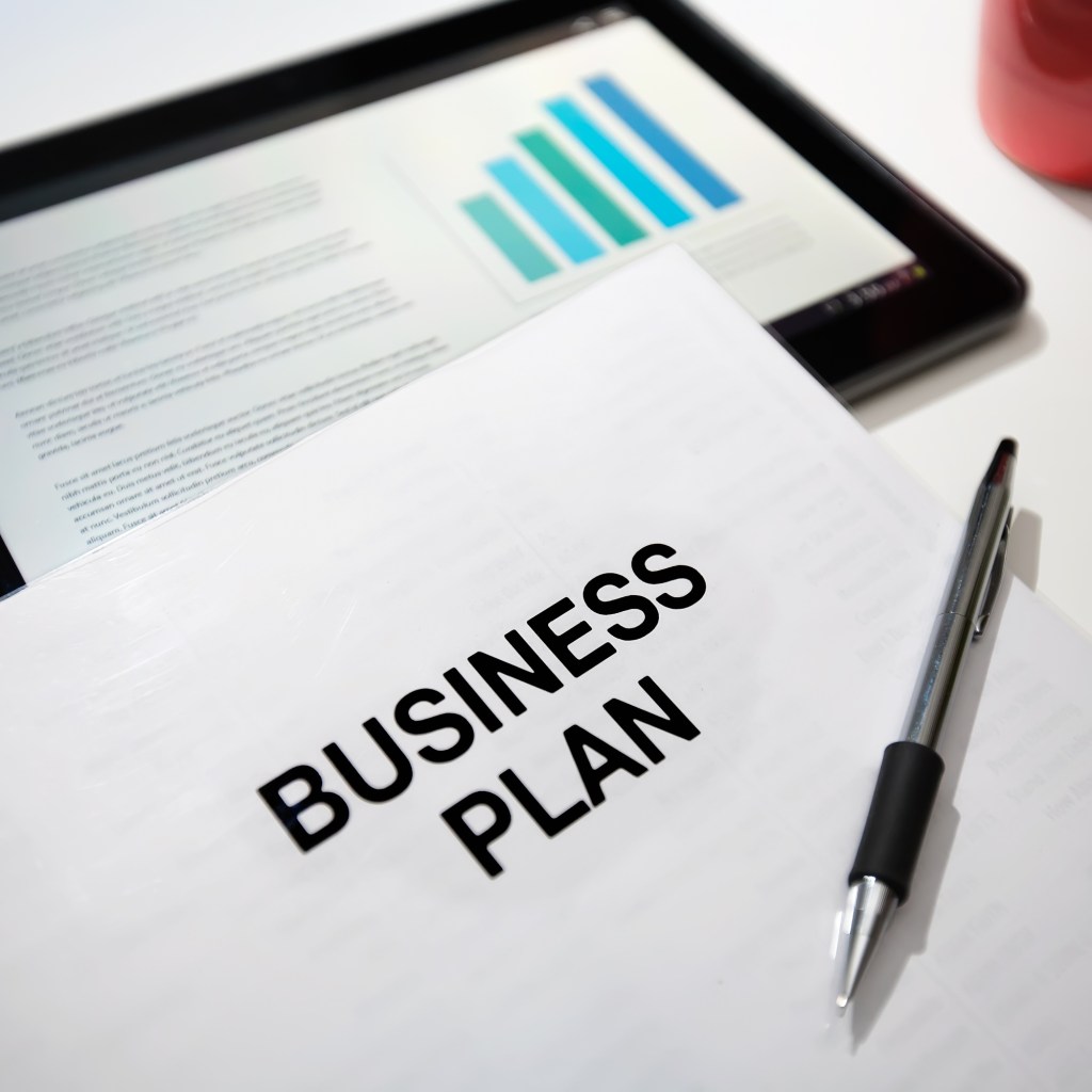 Business Plan Strategy With Touchscreen Presentation