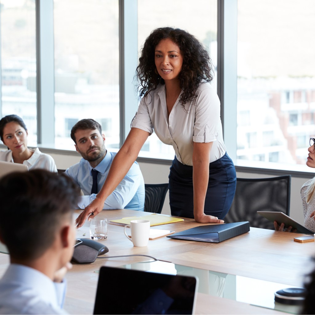 Female business leader holds meeting