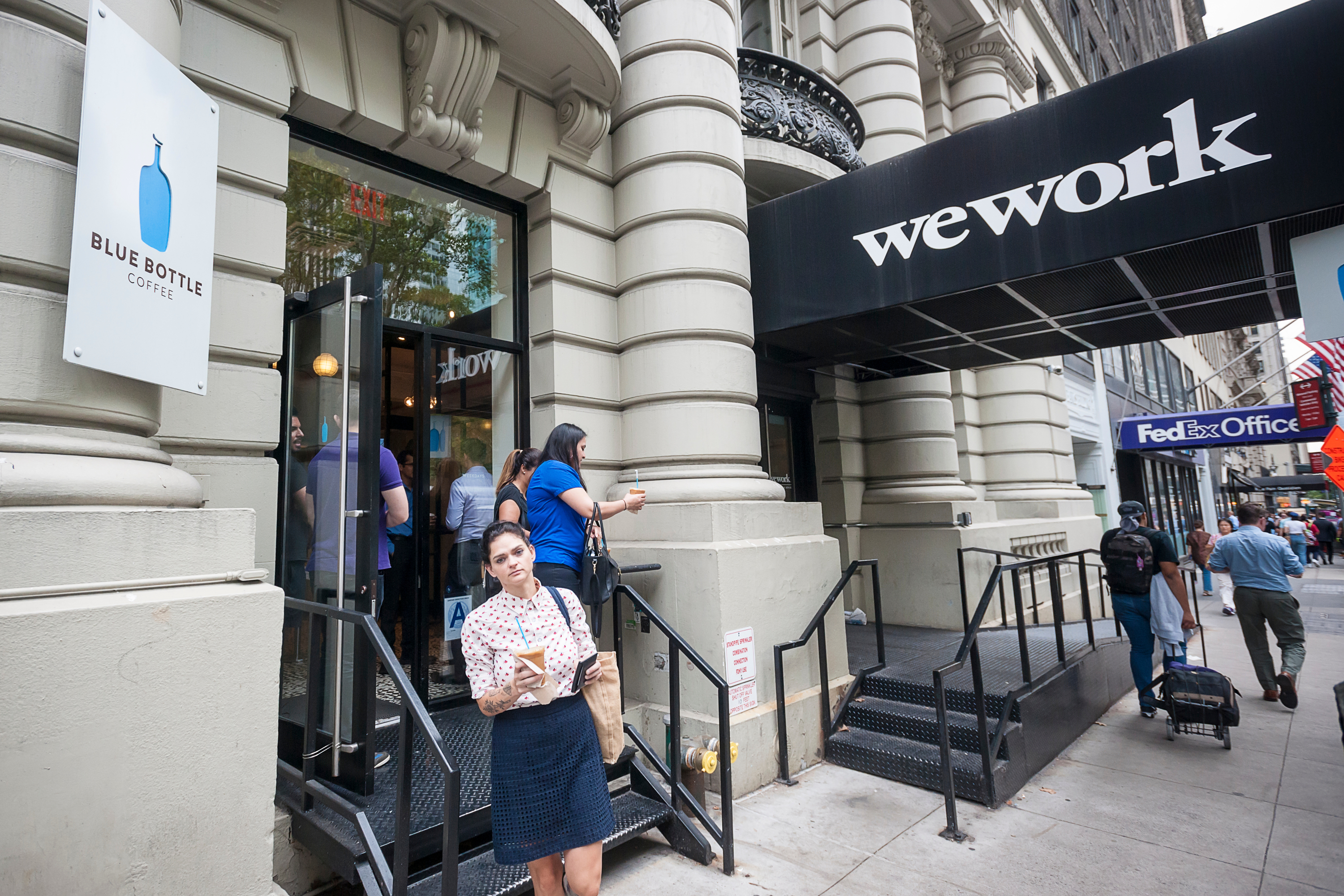 Woman Leaving WeWork Office