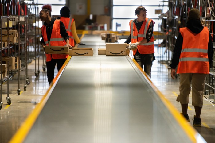Workers in Amazon warehouse