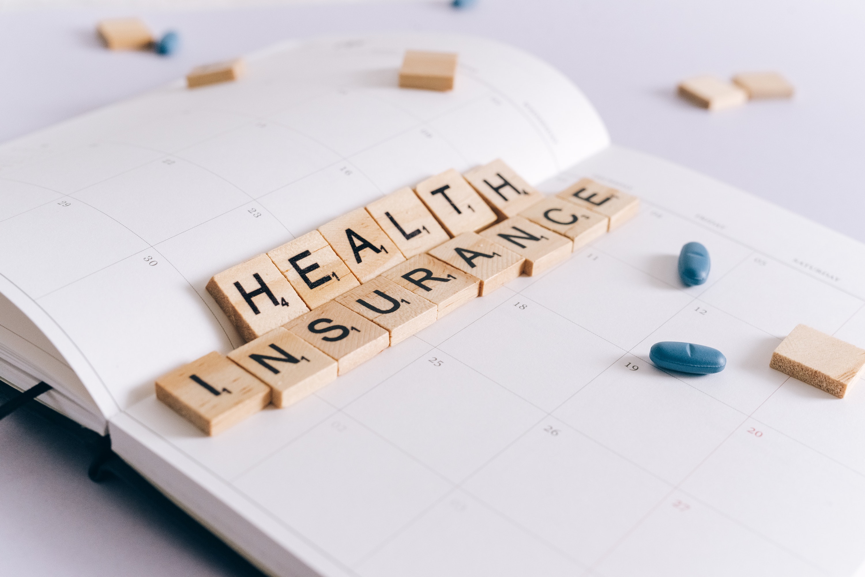 Health insurance Scrabble tiles