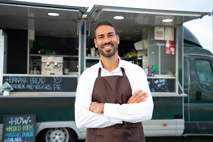 Cheerful food truck owner