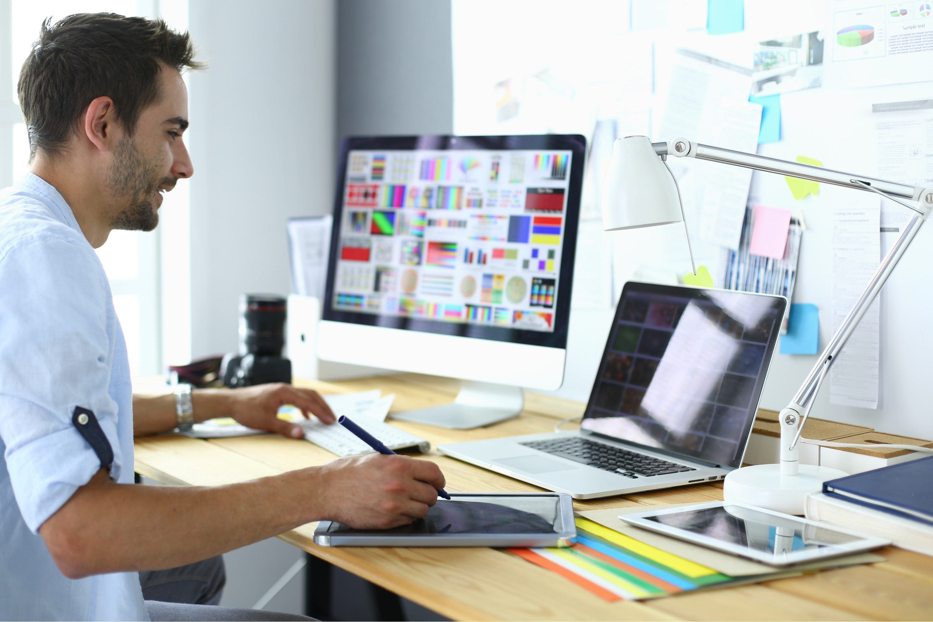 Graphic Designer Working On Logo