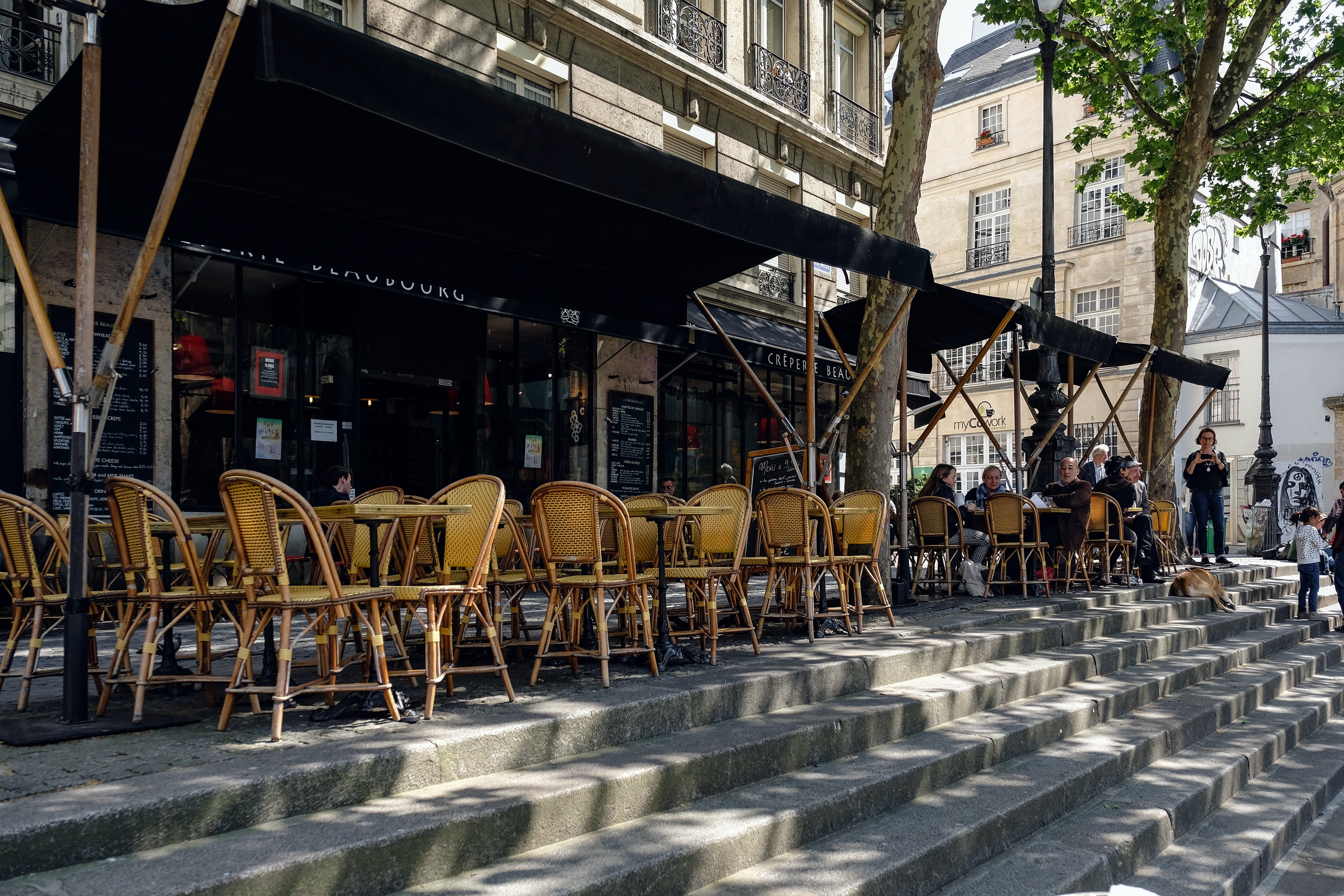 Empty chairs on restaurant patio