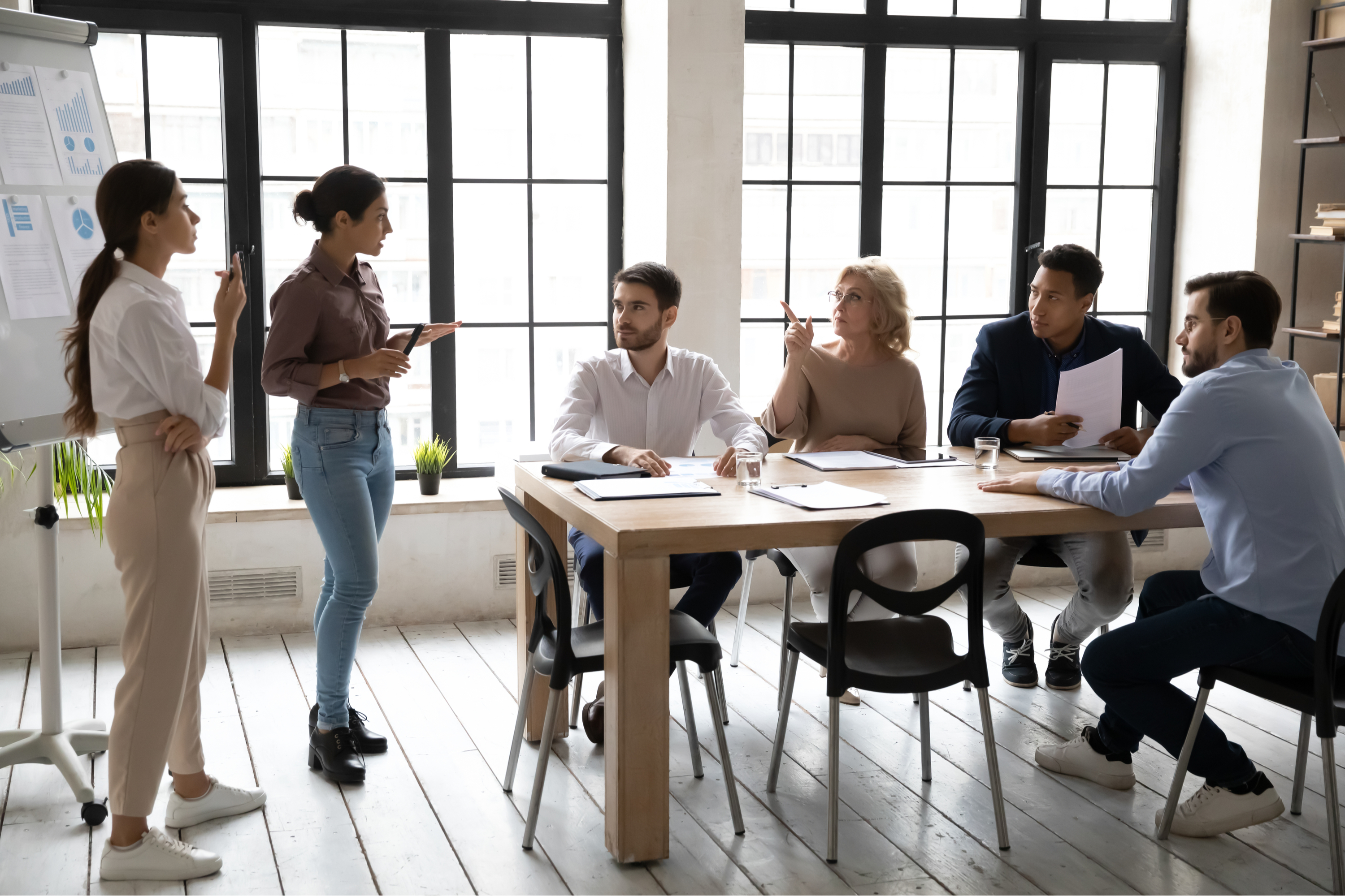 Business Women Giving Presentation