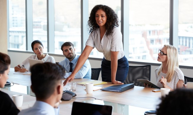 Female leader speaking at a meeting