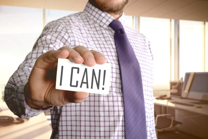 workplace personal growth business man holding card with text  i can