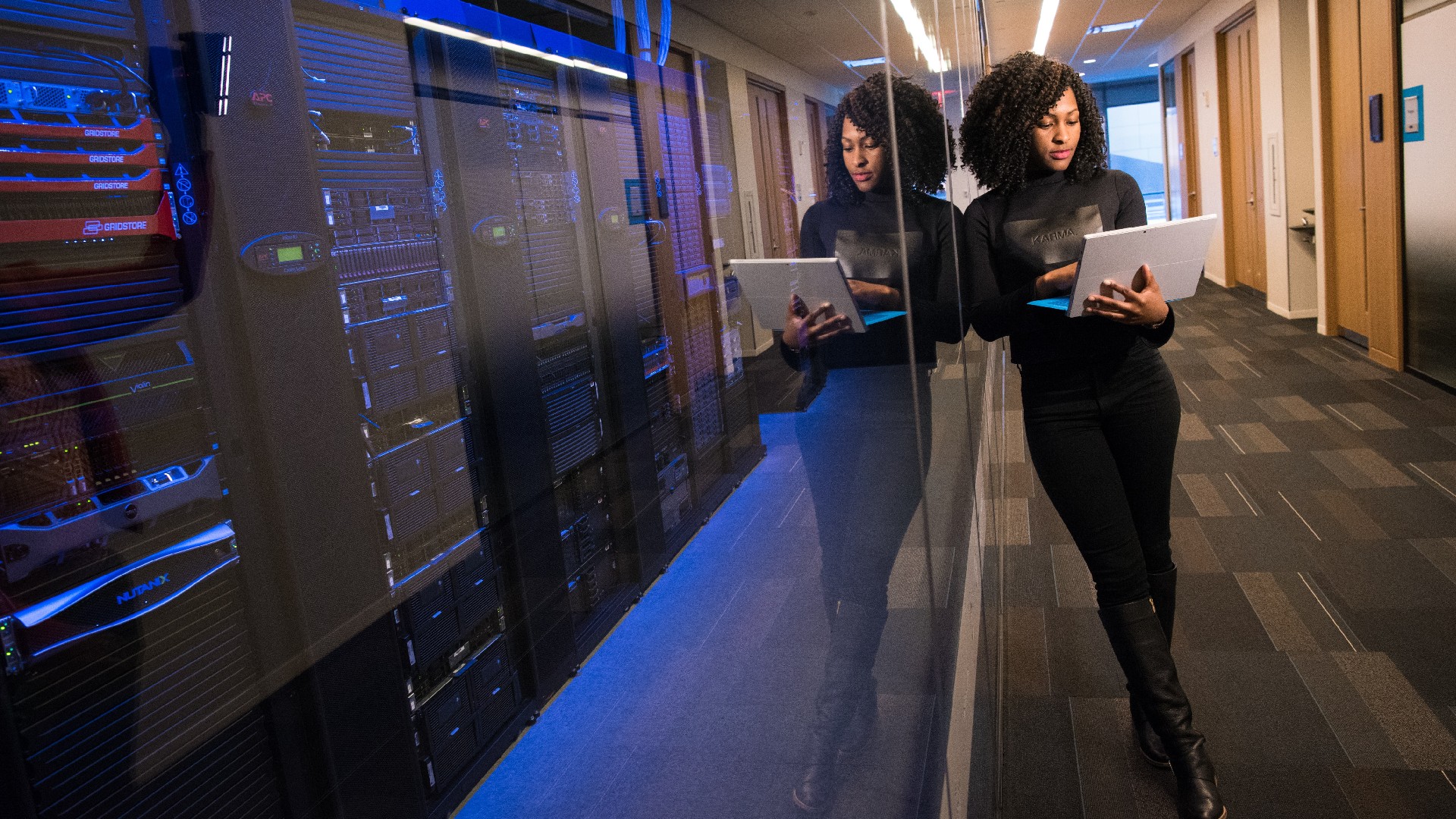 woman next to servers