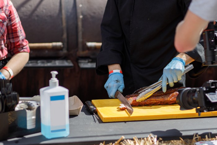 restaurant health code violations chef slicing delicious bbq meat at street market on table