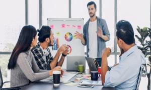 marketing on a budget creative director team lead brainstrom branding project with designer