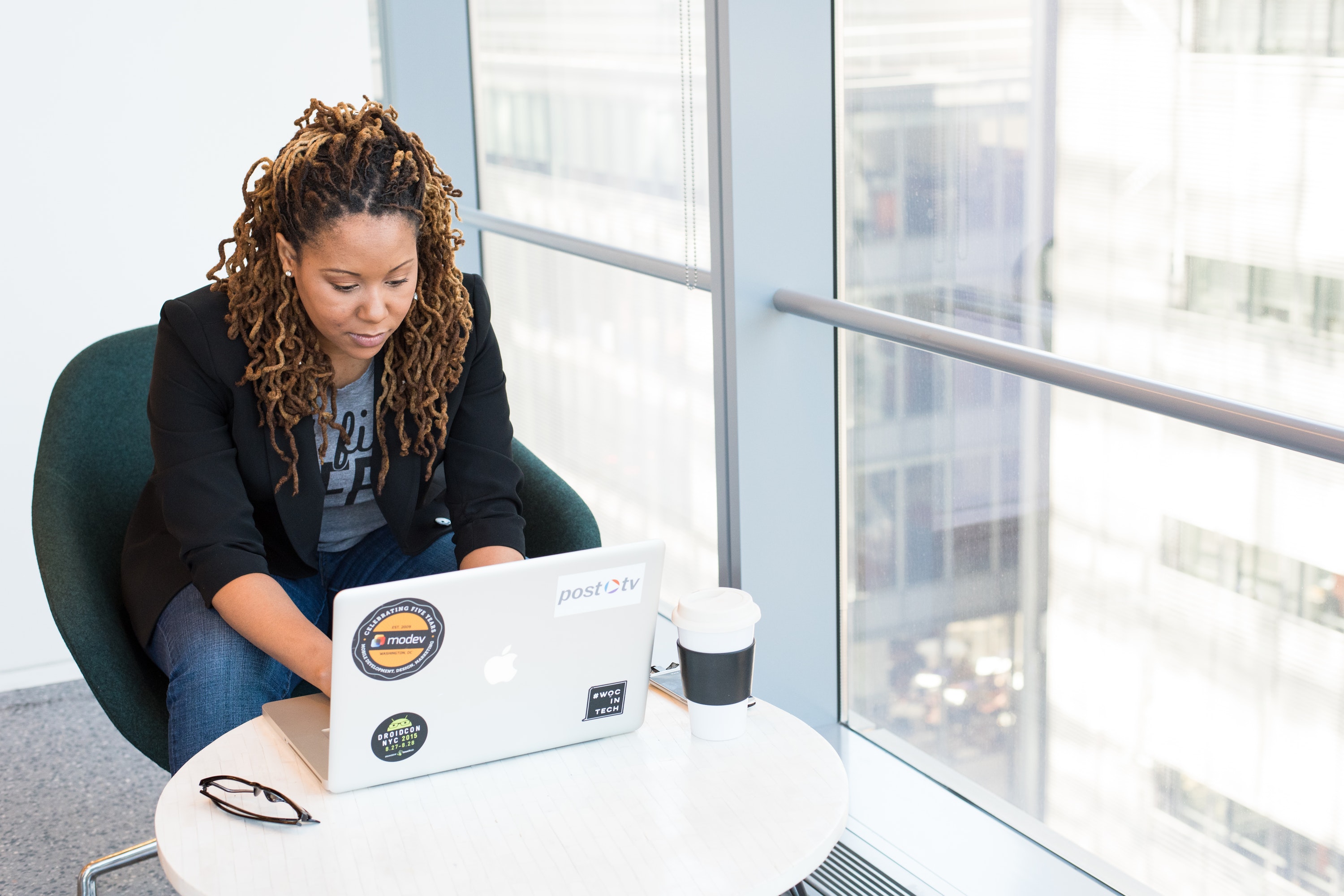 African American woman using laptop