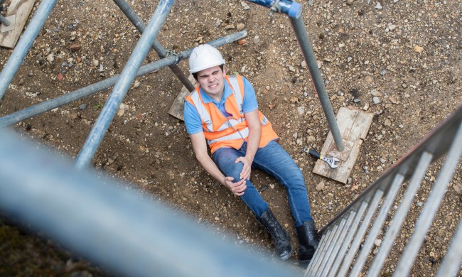 Construction worker falling from ladder