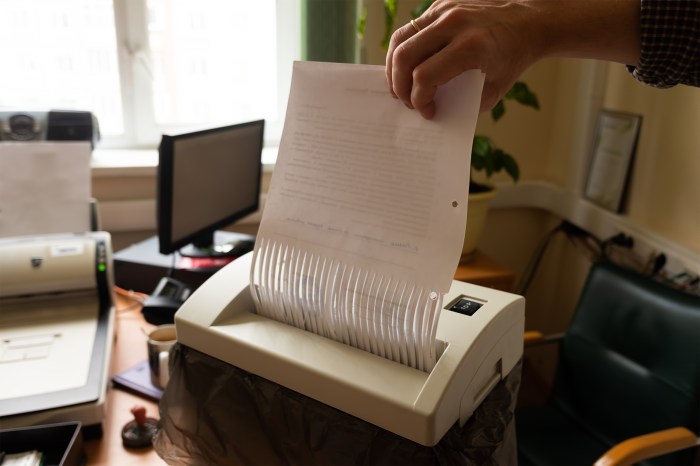 Shredding documents in paper shredder