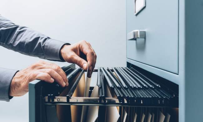 Individual going through files