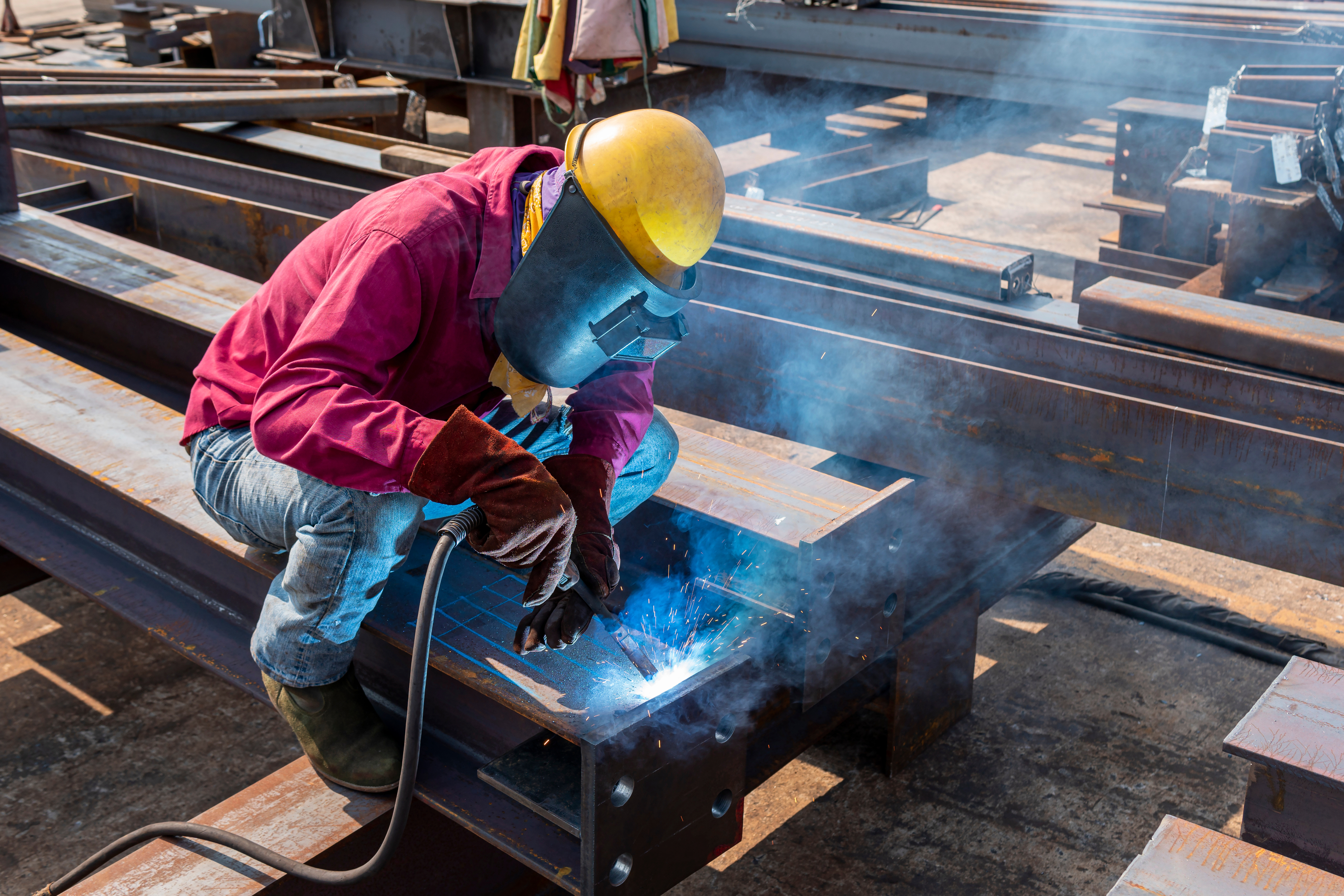 Man with welding shield