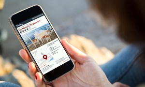 Person using restaurant review app
