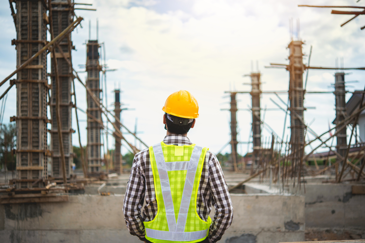 Construction worker overseeing work site