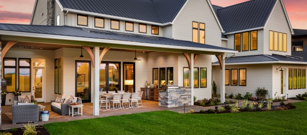 how to attach a patio roof an existing house beautiful luxury home exterior at sunset  featuring large covered with outdoor k