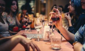 People drinking while dining